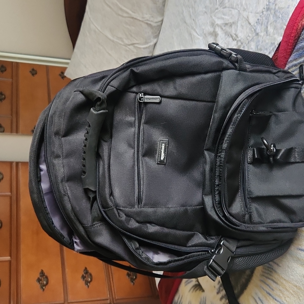 8 pocket black back pack